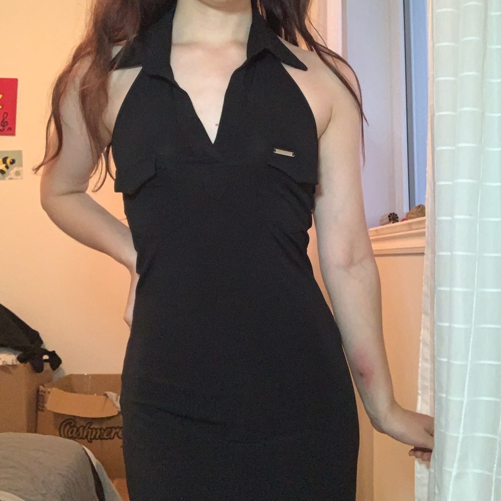 Black sleeveless dress with a collar